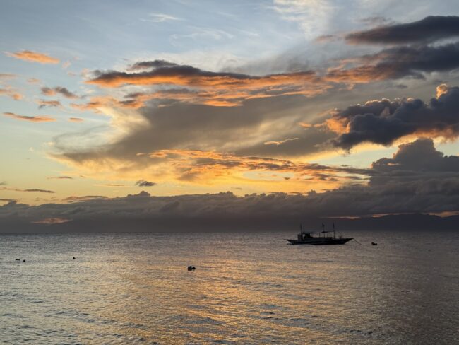 Sunset looking over the ocean of Moalboal