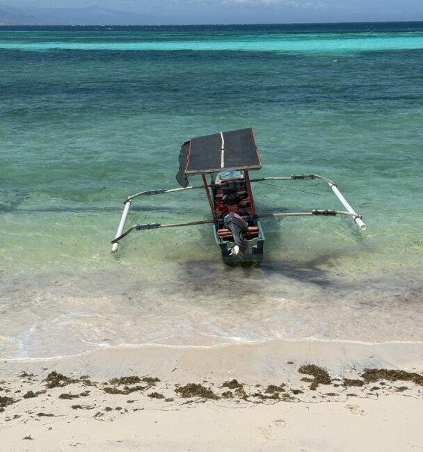 Boating using a local outrigger in the Atauro Islands